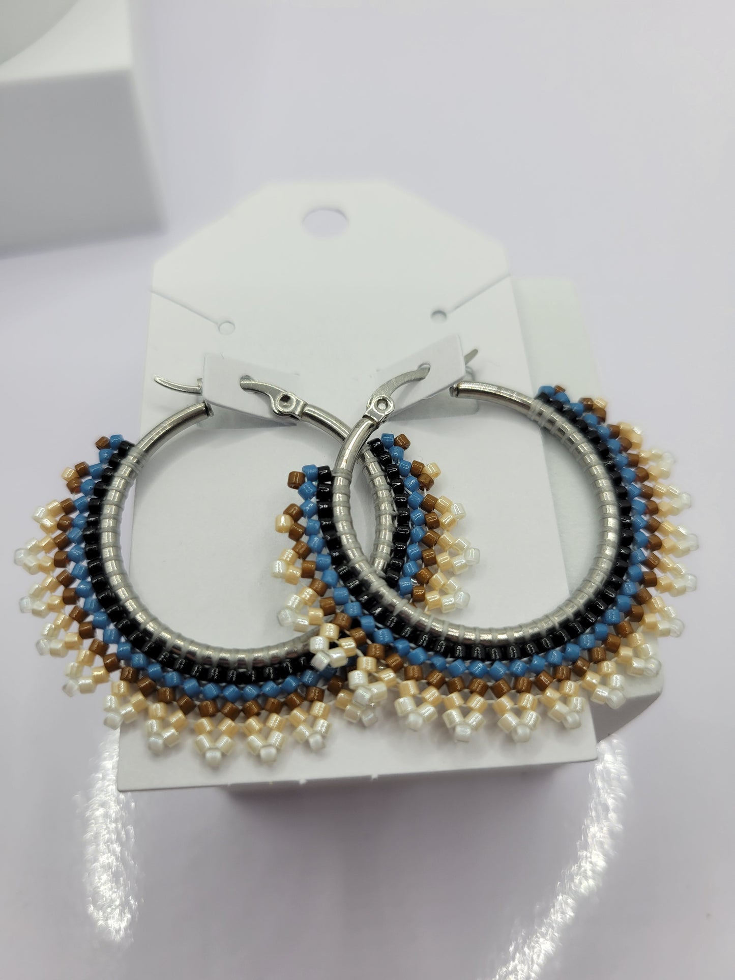 Multi-colored seed bead hoop earring